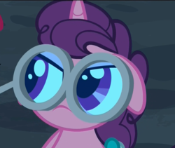 Size: 975x822 | Tagged: safe, screencap, sugar belle, pony, unicorn, g4, hard to say anything, angry, cropped, ears back, female, glasses, magnifying glass, mare, meme, mouth hold, solo, special eyes, unamused