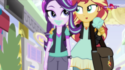 Size: 1366x767 | Tagged: safe, screencap, starlight glimmer, sunset shimmer, equestria girls, equestria girls specials, g4, my little pony equestria girls: mirror magic, bag, beanie, clothes, eating, face, food, geode of empathy, hat, hug, ice cream, ice cream cone, magical geodes, messy eating, teletoon, thick, wat, wide hips