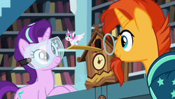 Size: 1920x1080 | Tagged: safe, screencap, princess flurry heart, starlight glimmer, sunburst, pony, unicorn, celestial advice, g4, clock, cuckoo clock, female, glasses, goggles, library, male, mare, safety goggles, stallion