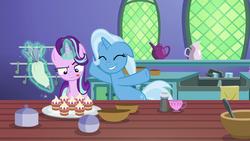 Size: 1920x1080 | Tagged: safe, screencap, starlight glimmer, trixie, pony, all bottled up, g4, cup, duo, floppy ears, icing bag, magic, salt shaker, teacakes, teacup, tongue out