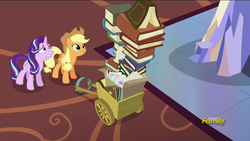Size: 1920x1080 | Tagged: safe, screencap, applejack, starlight glimmer, earth pony, pony, unicorn, every little thing she does, g4, season 6, applejack's hat, book, carpet, cart, cowboy hat, duo, gritted teeth, hat, nervous, twilight's castle