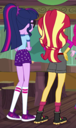 Size: 363x614 | Tagged: safe, screencap, sci-twi, sunset shimmer, twilight sparkle, equestria girls, g4, my little pony equestria girls: legend of everfree, camp everfree outfits, clothes, converse, cropped, crossed arms, hand on hip, raised leg, rear view, sci-twibutt, shoes, sneakers