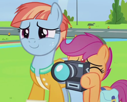 Size: 591x475 | Tagged: safe, screencap, scootaloo, windy whistles, pony, g4, my little pony: friendship is magic, parental glideance, camera, cropped, duo, female, mare, saddle bag