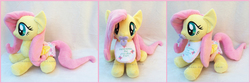 Size: 2239x742 | Tagged: safe, artist:lilmoon, fluttershy, pony, g4, adult foal, bib, cute, diaper, diapered plushie, irl, non-baby in diaper, pacifier, photo, plushie, shyabetes, solo