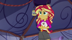 Size: 1280x720 | Tagged: safe, screencap, sunset shimmer, equestria girls, g4, my little pony equestria girls: legend of everfree, camp everfree outfits, clothes, female, fist, shorts, solo, tent