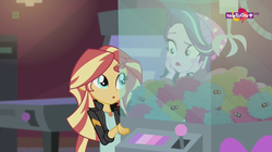 Size: 1136x638 | Tagged: safe, screencap, starlight glimmer, sunset shimmer, equestria girls, equestria girls specials, g4, my little pony equestria girls: mirror magic, canterlot mall, cinema, geode of empathy, magical geodes, teletoon