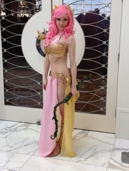 Size: 720x960 | Tagged: safe, artist:lizbrickleycosplay, fluttershy, human, g4, archery, armor, bow, breasts, chest protector, cleavage, clothes, cosplay, costume, female, irl, irl human, loincloth, midriff, my little pony princess warriors, photo, sexy, skirt, solo, unconvincing armor