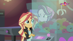 Size: 1136x638 | Tagged: safe, screencap, starlight glimmer, sunset shimmer, equestria girls, equestria girls specials, g4, mirror magic, canterlot mall, cinema, geode of empathy, magical geodes, smiling, teletoon