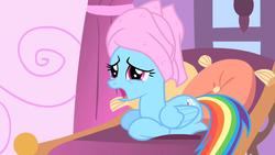 Size: 1280x720 | Tagged: safe, screencap, rainbow dash, pegasus, pony, g4, the best night ever, female, folded wings, mare, open mouth, ponyloaf, prone, solo, towel, worried