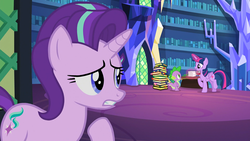 Size: 1920x1080 | Tagged: safe, screencap, spike, starlight glimmer, twilight sparkle, alicorn, dragon, pony, unicorn, every little thing she does, g4, season 6, book, bookshelf, female, flash cards, gritted teeth, library, magic, male, mare, raised hoof, telekinesis, twilight sparkle (alicorn), twilight's castle, twilight's castle library, worried
