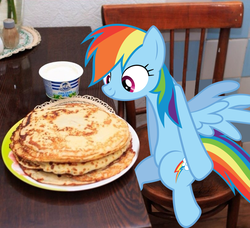 Size: 811x739 | Tagged: artist needed, safe, rainbow dash, pony, g4, blini, chair, food, irl, kot blini, looking at something, pancake day, pancakes, photo, ponies in real life, russian, sitting, solo, sour cream, table