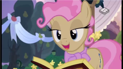 Size: 961x541 | Tagged: safe, screencap, mayor mare, pony, g4, the perfect pear, book, lidded eyes, marriage, non-dyed mayor, wedding, younger