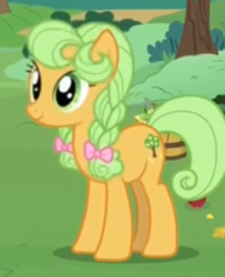 Size: 448x551 | Tagged: safe, screencap, goldie delicious, earth pony, pony, g4, the perfect pear, bow, braid, cropped, female, hair bow, mare, solo, young goldie delicious, younger