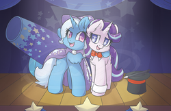 Size: 1277x830 | Tagged: safe, artist:sapphfyr, starlight glimmer, trixie, pony, unicorn, g4, assistant, cannon, chest fluff, duo, duo female, female, hat, hug, looking at each other, mare, spotlight, stage, top hat, trixie's cannon, wand