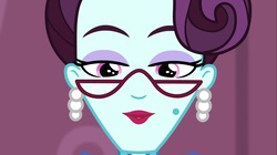 Size: 1100x618 | Tagged: safe, screencap, principal abacus cinch, equestria girls, g4, my little pony equestria girls: friendship games, ear piercing, earring, female, glasses, jewelry, looking at you, open mouth, piercing, solo