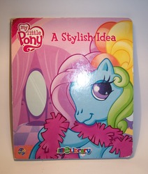 Size: 1375x1620 | Tagged: safe, photographer:kisscurl, rainbow dash (g3), pony, g3, g3.5, official, a stylish idea, book, book cover, cover, heart, heart eyes, irl, merchandise, photo, rainbow dash always dresses in style, solo, wingding eyes