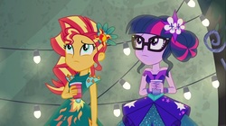 Size: 1100x618 | Tagged: safe, screencap, sci-twi, sunset shimmer, twilight sparkle, equestria girls, g4, my little pony equestria girls: legend of everfree, bare shoulders, clothes, crystal gala, decoration, dress, female, sleeveless, strapless