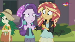 Size: 1136x638 | Tagged: safe, screencap, starlight glimmer, sunset shimmer, sweet leaf, equestria girls, equestria girls specials, g4, my little pony equestria girls: mirror magic, background human, geode of empathy, magical geodes, teletoon, worried