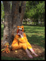 Size: 3000x4000 | Tagged: safe, artist:krazykari, applejack, human, g4, animal costume, apple, applelion, clothes, cosplay, costume, food, high res, irl, irl human, photo, plushie, solo, tree