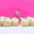 Size: 480x480 | Tagged: safe, pinkie pie, earth pony, pony, g4, animated, brushable, copyright, cupcake, cute, diapinkes, eating, female, food, frosting, gif, hasbro, irl, looking at you, looking back, looking back at you, looking down, mare, open mouth, photo, solo, stop motion, toy