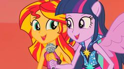 Size: 1920x1080 | Tagged: safe, screencap, sunset shimmer, twilight sparkle, equestria girls, g4, my little pony equestria girls: rainbow rocks, cute, female, microphone, ponied up, rainbow rocks outfit, rebecca shoichet, shimmerbetes, twiabetes, twilight sparkle (alicorn), voice actor joke, welcome to the show