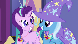 Size: 1280x720 | Tagged: safe, screencap, starlight glimmer, trixie, pony, unicorn, celestial advice, g4, cute, diatrixes, equestrian pink heart of courage, eye contact, female, glimmerbetes, grin, hoof hold, jewelry, looking at each other, mare, necklace, smiling, squee