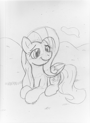 Size: 2550x3506 | Tagged: safe, artist:otakuponi, fluttershy, pegasus, pony, g4, female, folded wings, grayscale, high res, lying down, monochrome, prone, smiling, solo, traditional art, turned head