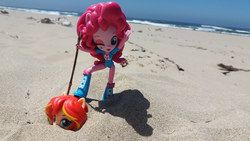 Size: 2064x1161 | Tagged: safe, artist:nightfly19, pinkie pie, sunset shimmer, equestria girls, g4, abuse, beach, doll, equestria girls minis, eqventures of the minis, irl, ocean, photo, shimmerbuse, stick, toy