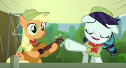 Size: 554x297 | Tagged: safe, applejack, coloratura, pony, g4, the mane attraction, clothes, clothes hanger, eyes closed, faic, female, filly, guitar, hat, musical instrument, singing
