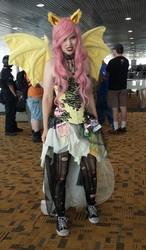 Size: 1711x2922 | Tagged: safe, fluttershy, bat pony, human, bronycon, bronycon 2017, g4, clothes, contact lens, converse, corset, cosplay, costume, flutterbat, irl, irl human, photo, race swap, ripped stockings, shoes, sneakers