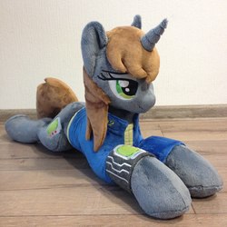 Size: 960x960 | Tagged: safe, artist:burgunzik, oc, oc only, oc:littlepip, pony, unicorn, fallout equestria, clothes, cutie mark, fanfic, fanfic art, female, hooves, horn, irl, jumpsuit, lying down, mare, photo, pipbuck, plushie, prone, solo, vault suit