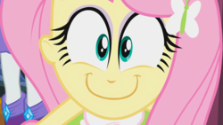 Size: 1920x1080 | Tagged: safe, screencap, fluttershy, rarity, equestria girls, g4, my little pony equestria girls, close-up, face of mercy, faic, female, grin, happy, happyshy, smiling, solo
