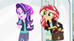 Size: 1280x718 | Tagged: safe, screencap, starlight glimmer, sunset shimmer, equestria girls, equestria girls specials, g4, my little pony equestria girls: mirror magic, beanie, clothes, hat, jacket, lidded eyes, vest
