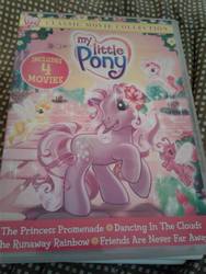 Size: 720x960 | Tagged: safe, tiddly wink, tra-la-la, wysteria, zipzee, breezie, earth pony, pony, dancing in the clouds, friends are never far away, g3, the princess promenade, the runaway rainbow, dvd, irl, photo
