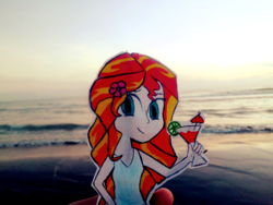 Size: 950x713 | Tagged: safe, artist:daniel-phoenixd, sunset shimmer, human, pony, g4, beach, drinking, hulashimmer, human coloration, humanized, irl, ocean, paper child, photo, smiling, solo