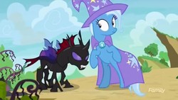 Size: 1280x720 | Tagged: safe, screencap, pharynx, trixie, changeling, g4, to change a changeling, cape, cliff, clothes, hat, road, tree, trixie's cape, trixie's hat
