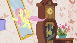 Size: 1280x720 | Tagged: safe, screencap, fluttershy, pegasus, pony, discordant harmony, g4, butt, female, holding, mare, mirror, plot, solo, spread wings, wings