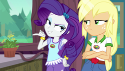 Size: 1280x720 | Tagged: safe, screencap, applejack, rarity, equestria girls, g4, my little pony equestria girls: legend of everfree, camp everfree outfits, clothes, crossed arms, denim shorts, duo, freckles, plant, tree, wet hair