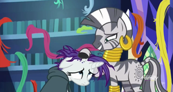Size: 1352x722 | Tagged: safe, screencap, rarity, zecora, pony, unicorn, zebra, g4, it isn't the mane thing about you, alternate hairstyle, comforting, discovery family logo, female, floppy ears, mare, petting, punk, raripunk, twilight's castle