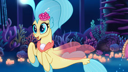 Size: 1777x1000 | Tagged: safe, screencap, princess skystar, seapony (g4), g4, my little pony: the movie, bioluminescent, blue eyes, blushing, bubble, coral, cropped, cute, dorsal fin, female, fin, fin wings, fins, fish tail, floppy ears, flower, flower in hair, flowing mane, flowing tail, freckles, glowing, happy, jewelry, necklace, ocean, open mouth, open smile, pearl necklace, seaquestria, seashell, seaweed, skyabetes, smiling, solo, swimming, tail, underwater, water, wings