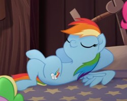 Size: 356x282 | Tagged: safe, screencap, rainbow dash, g4, my little pony: the movie, bed, butt, cropped, lying, lying on bed, plot