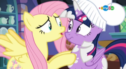 Size: 854x470 | Tagged: safe, screencap, fluttershy, twilight sparkle, alicorn, pony, a health of information, g4, carousel (tv channel), chef's hat, duo, hat, now kiss, twilight sparkle (alicorn)