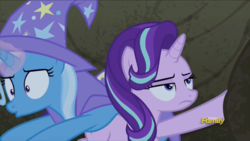 Size: 915x515 | Tagged: safe, screencap, starlight glimmer, trixie, pony, g4, to change a changeling, bagged, cape, clothes, discovery family logo, starlight glimmer is not amused, trixie's cape, unamused