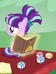 Size: 357x472 | Tagged: safe, screencap, starlight glimmer, pony, unicorn, g4, the crystalling, blocks, book, cropped, cute, female, filly, filly starlight glimmer, glimmerbetes, pigtails, younger