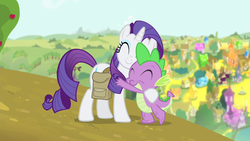 Size: 1280x720 | Tagged: safe, screencap, rarity, spike, dragon, pony, unicorn, g4, inspiration manifestation, cute, eyes closed, female, hill, hub logo, hug, male, mare, outdoors, ponyville, saddle bag, smiling, standing