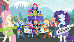 Size: 1275x717 | Tagged: safe, screencap, applejack, big macintosh, fluttershy, pinkie pie, rainbow dash, rarity, sci-twi, sunset shimmer, twilight sparkle, equestria girls, g4, get the show on the road, my little pony equestria girls: summertime shorts, bass guitar, bus, clothes, drums, fluttershy's skirt, geode of empathy, geode of fauna, geode of shielding, geode of super strength, geode of telekinesis, guitar, humane seven, keytar, mane six, microphone, musical instrument, ponied up, sci-twilicorn, studebaker, tambourine, the rainbooms, the rainbooms tour bus