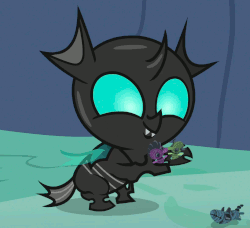 Size: 1182x1078 | Tagged: safe, screencap, spike, thorax, changeling, dragon, nymph, g4, season 7, to change a changeling, animated, cropped, cute, cuteling, doll, gif, loop, male, now kiss, smiling, solo, thorabetes, toy, younger
