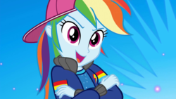 Size: 1280x720 | Tagged: safe, screencap, rainbow dash, equestria girls, g4, get the show on the road, my little pony equestria girls: summertime shorts, backwards ballcap, baseball cap, cap, clothes, crossed arms, female, hat, open mouth, rapper dash, solo
