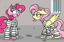 Size: 8267x5511 | Tagged: safe, artist:rainelathepegasus00, fluttershy, pinkie pie, pony, g4, absurd resolution, angry, bound wings, clothes, cuffed, cuffs, eye contact, fluttershy is not amused, grin, imprisoned, jail, looking at each other, prison, prison outfit, prison stripes, prisoner fs, prisoner pp, shackles, smiling, this ended in jail time, unamused, upset