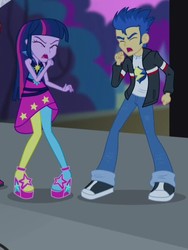 Size: 404x538 | Tagged: safe, screencap, flash sentry, twilight sparkle, equestria girls, g4, my little pony equestria girls: rainbow rocks, clothes, coughing, cropped, eyes closed, high heels, jacket, pants, pantyhose, rainbow rocks outfit, shoes, skirt, sneakers